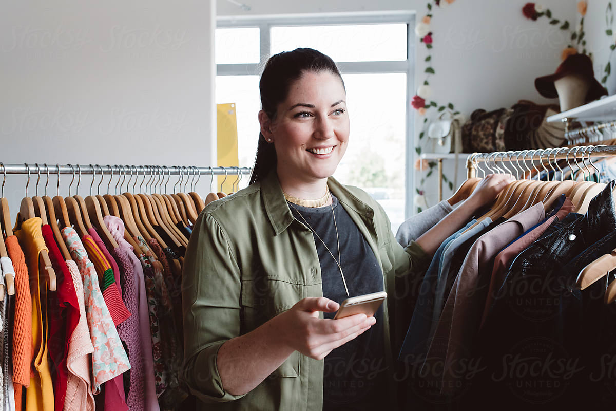 Small business owner using her mobile phone