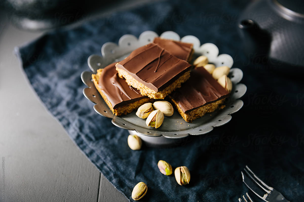 Pistachio shortbread squares with dark chocolate topping