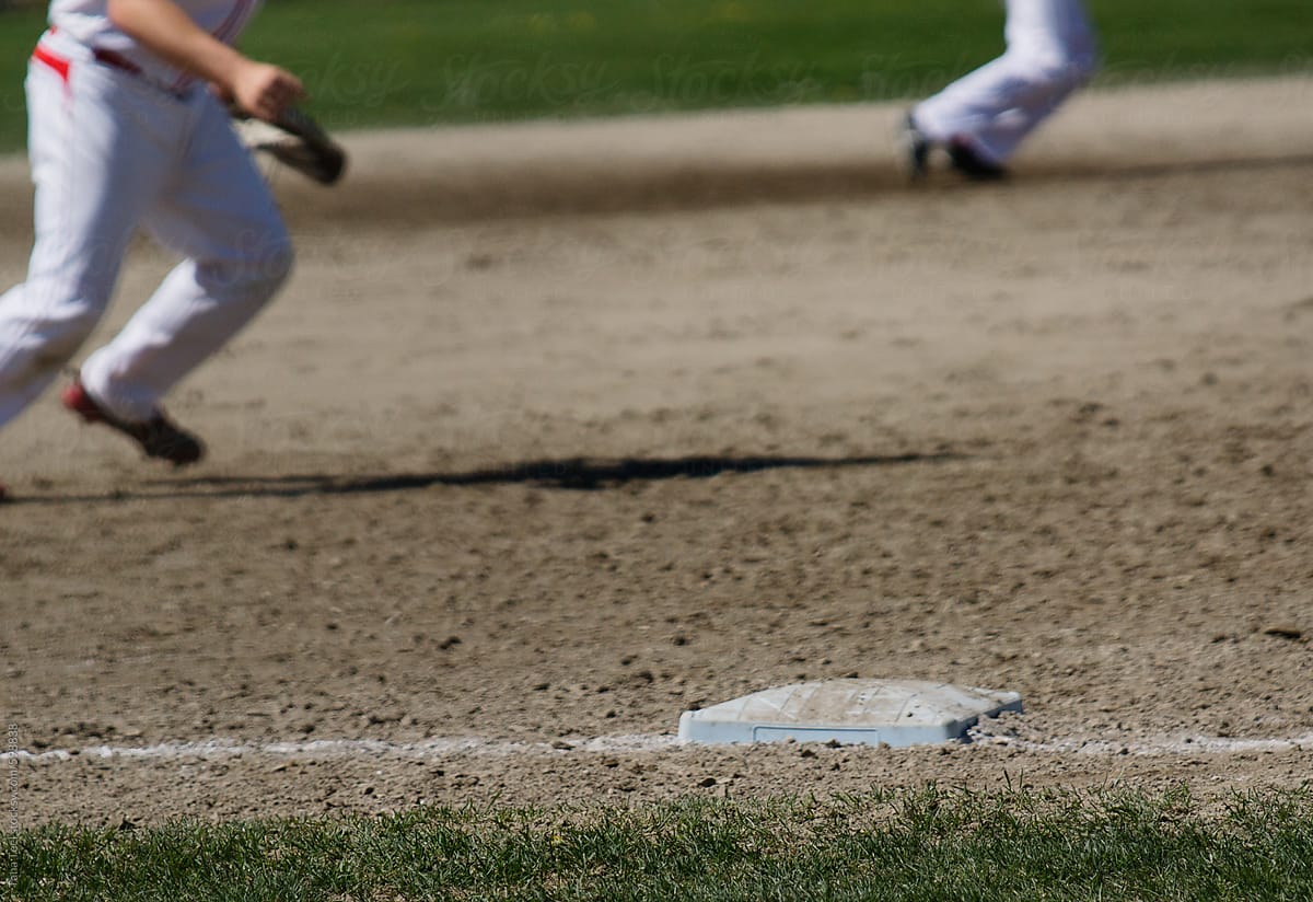 Third base on baseball diamond in foreground