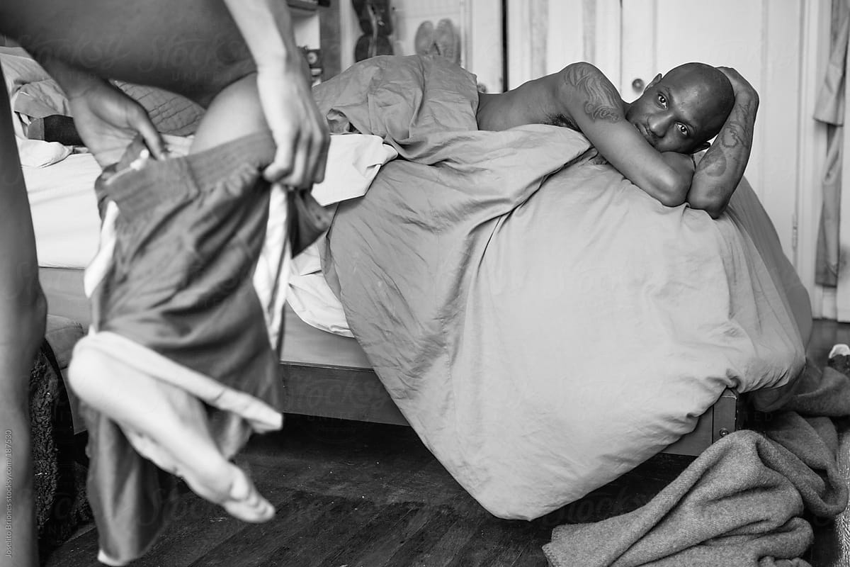 Black and White Photo of an Intimate Scene Between Two Gay Lovers in the Bedroom