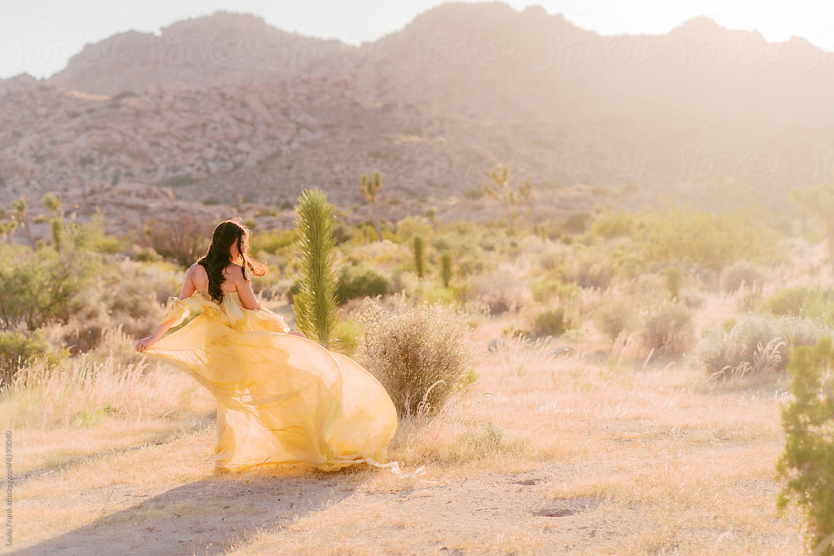 photoshoot in the desert of woman in flowy dress