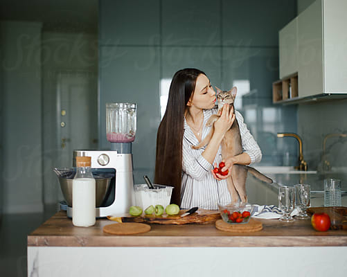 Person Putting Ice Cream To Blender by Stocksy Contributor Duet  Postscriptum - Stocksy