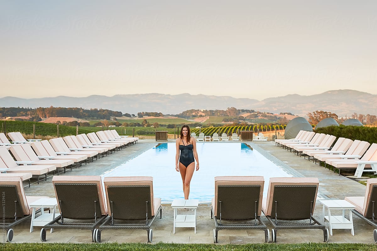 Beautiful Woman In Pool At Luxury Resort By Trinette Reed