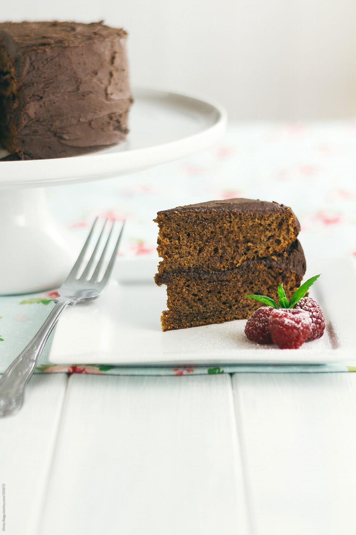 Slice of chocolate cake with copy space in foreground