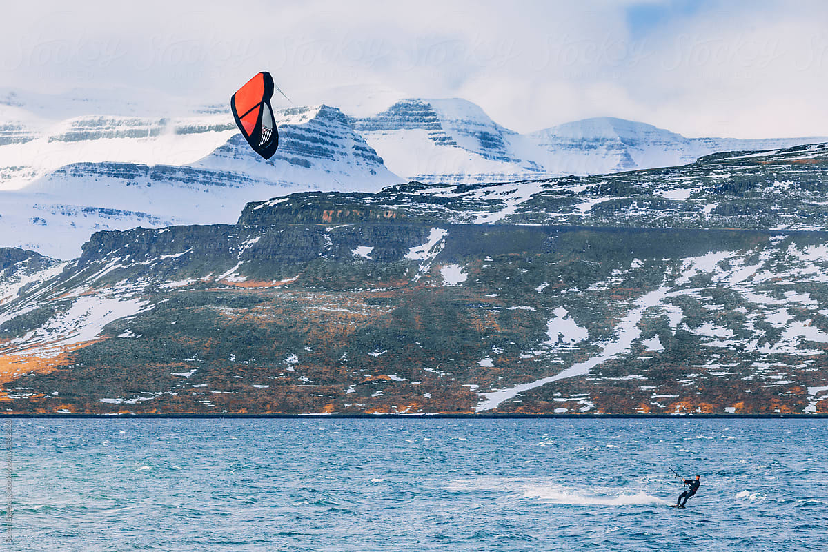 Man kitesurfing in Iceland in winter