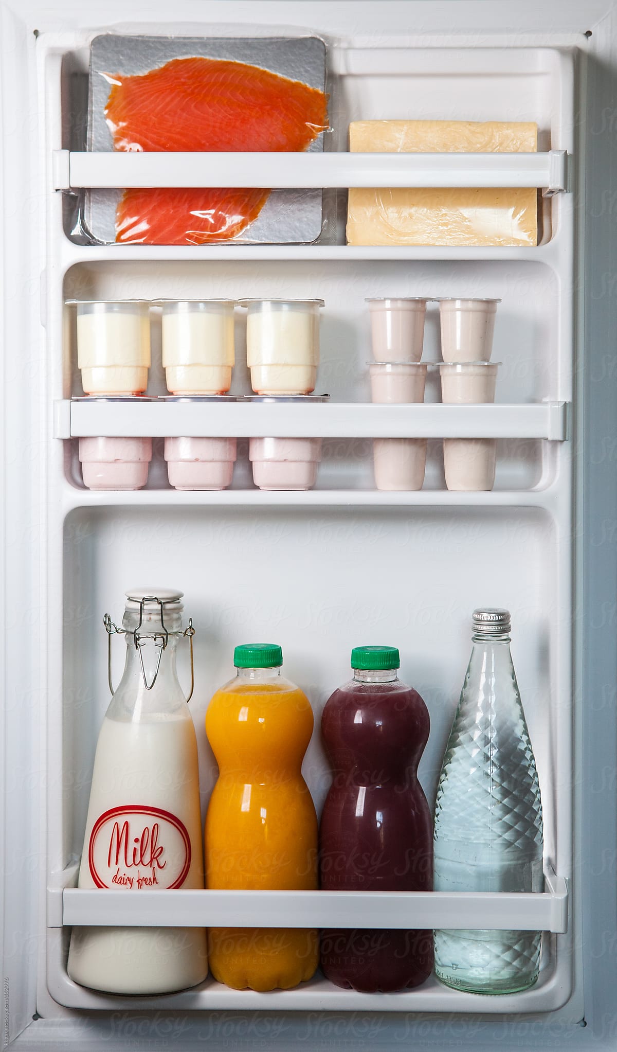 Refrigerator door with healthy food.