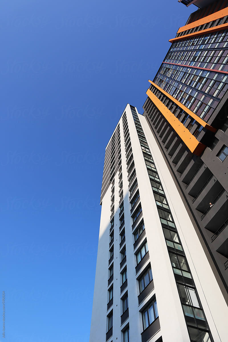 Modern High-rise Building Against Blue Sky