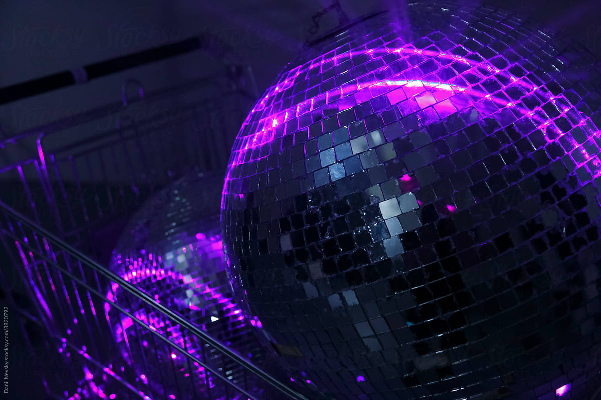 Shiny disco balls in neon lights