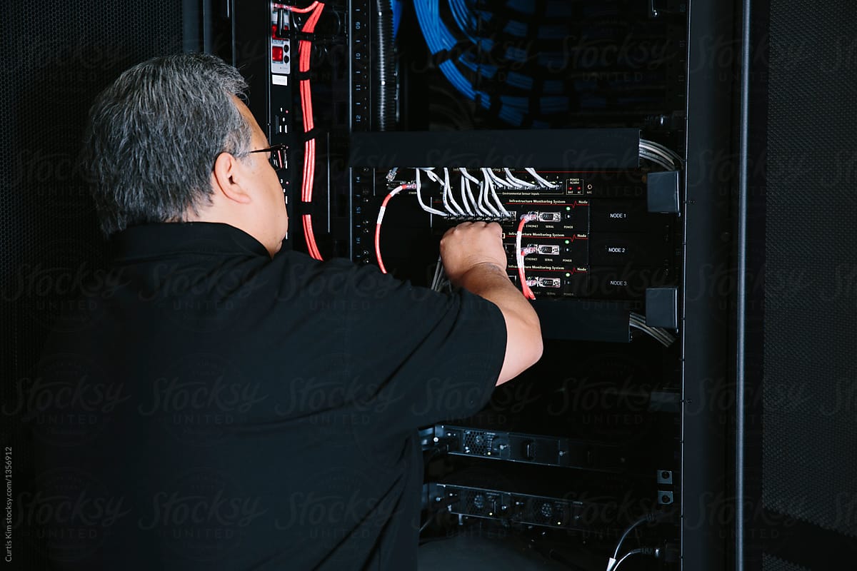IT computer expert working on servers