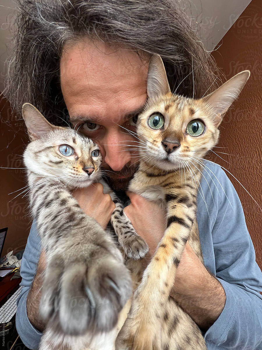 Man selfportrait with cats ugc
