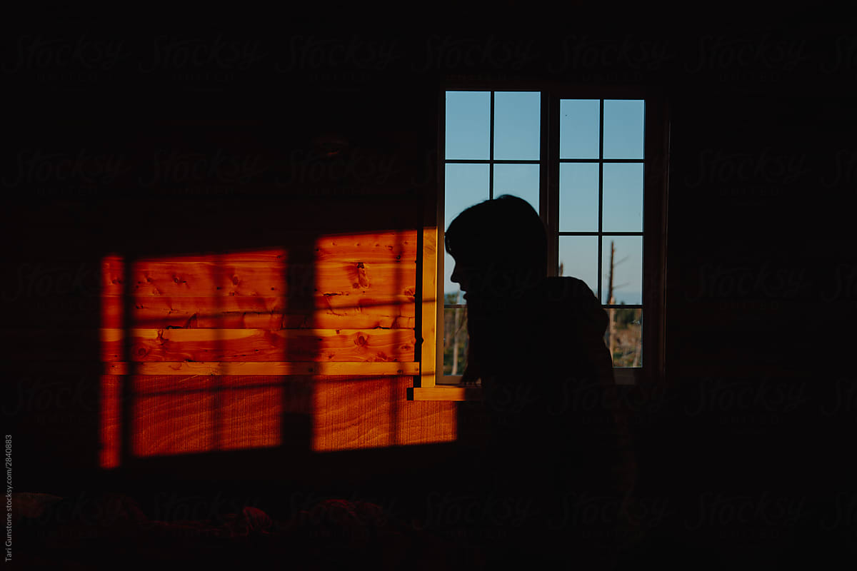 Evening light inside a log cabin