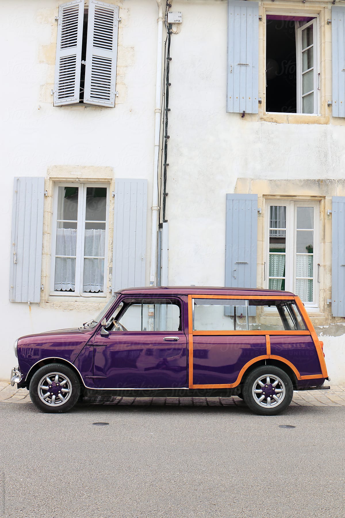 Classic car in front of house in France