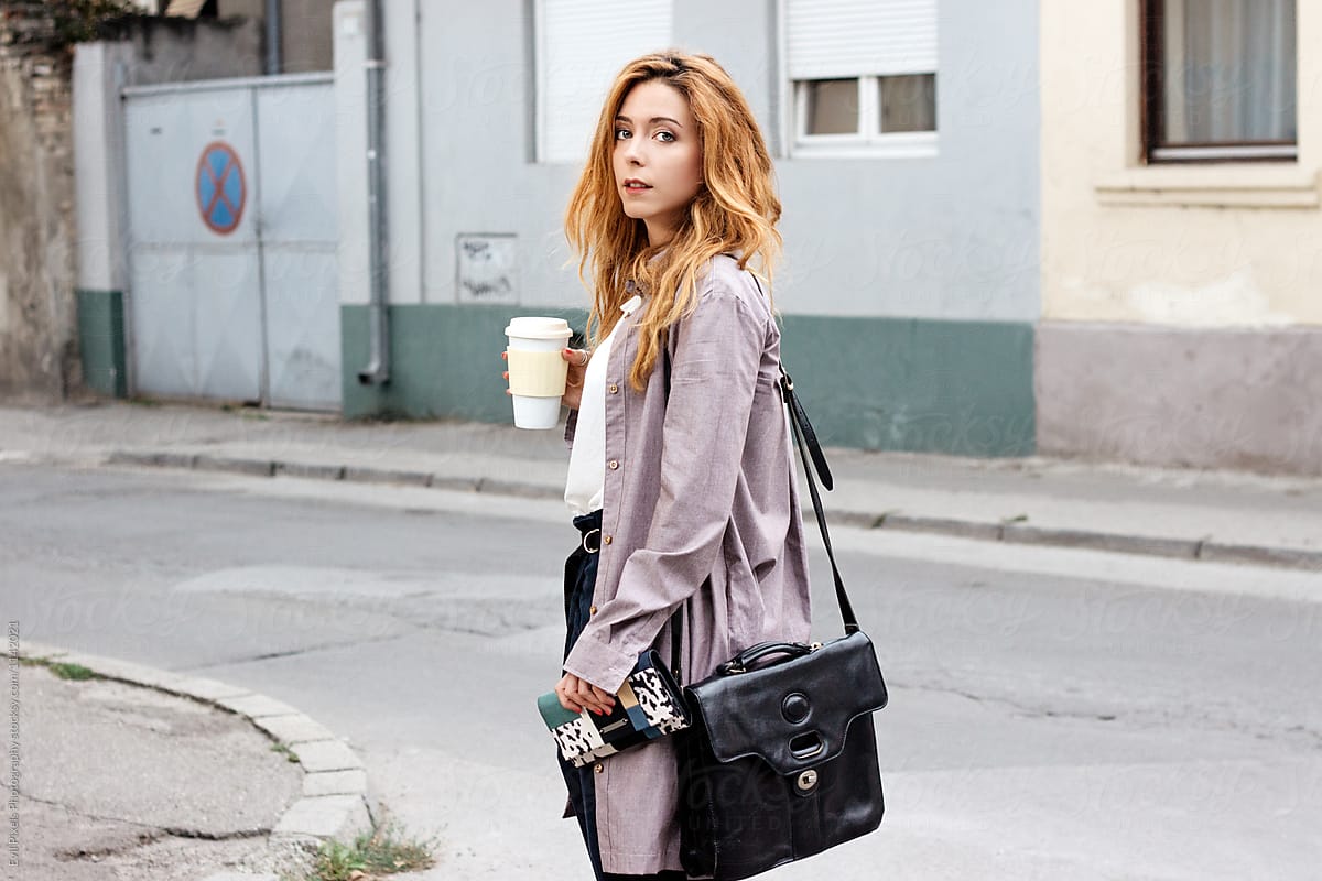 Business Woman Holding A Coffee To Go On The Street