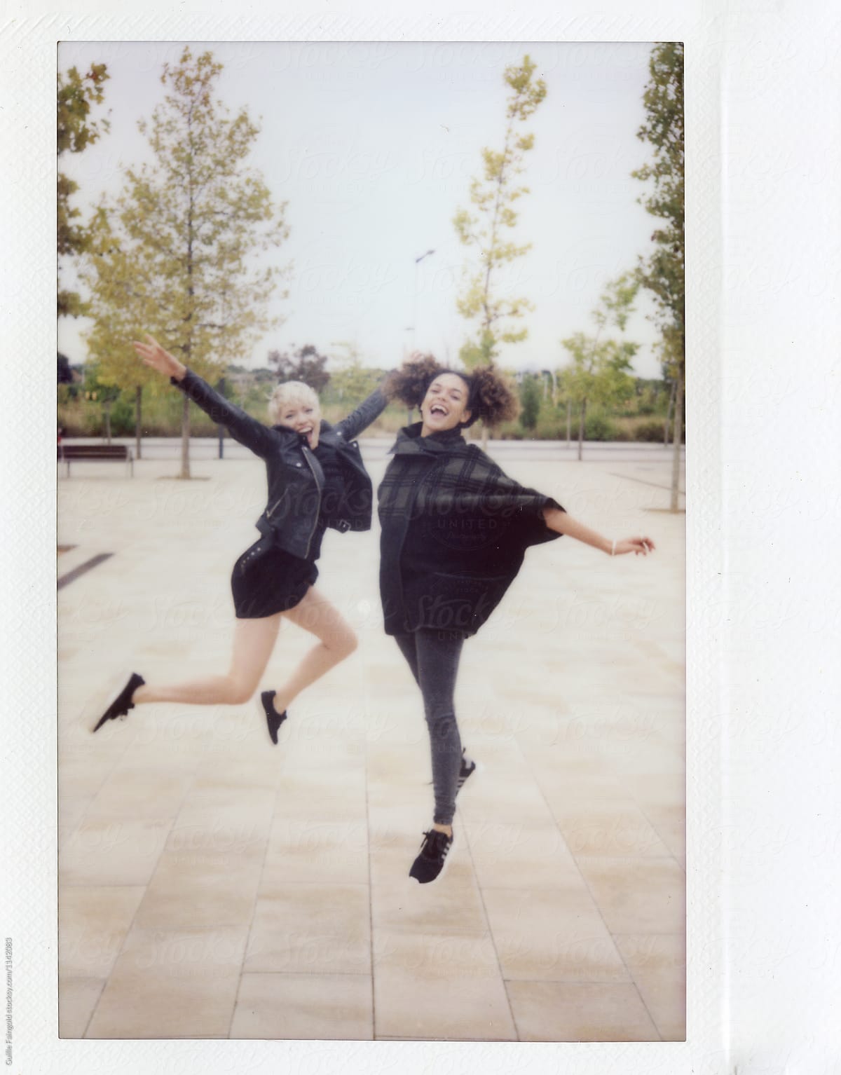 Joyful Girlfriends Having Fun In Park By Stocksy Contributor Guille Faingold Stocksy