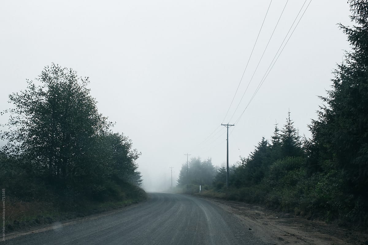 dark scary road with fog