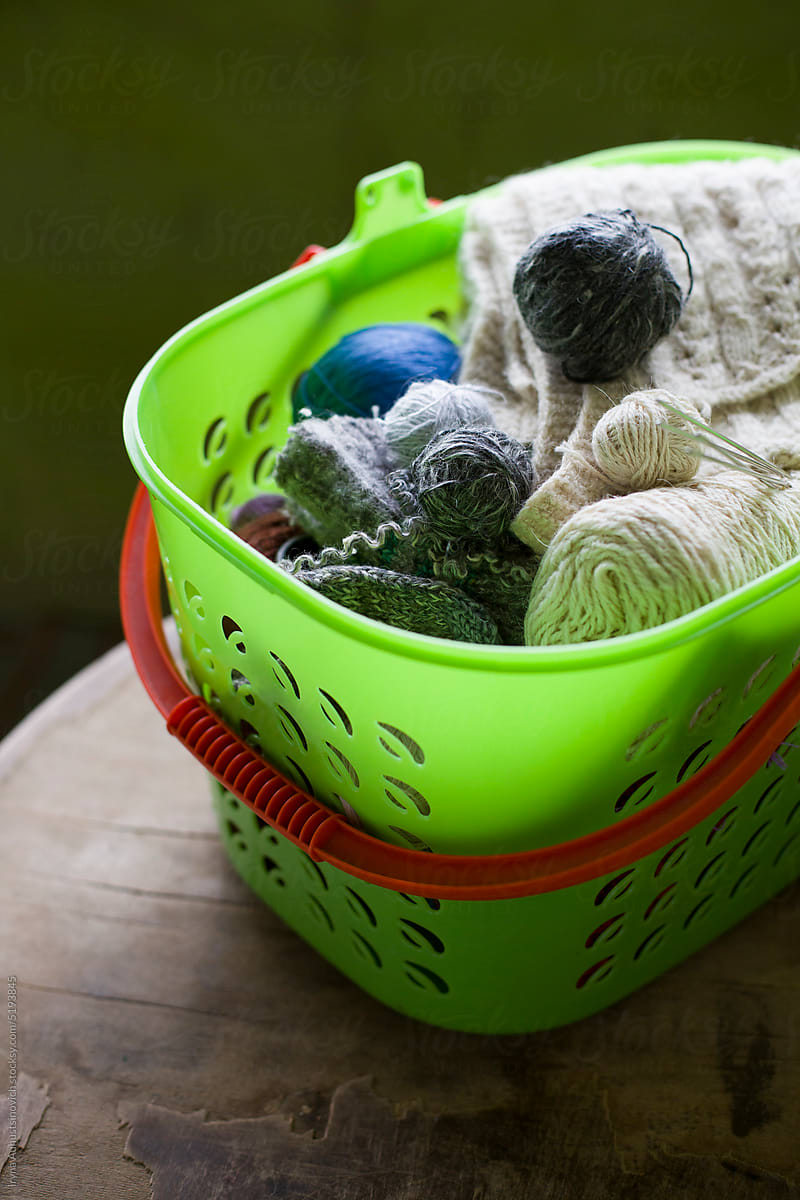 balls of yarn for knitting in the basket