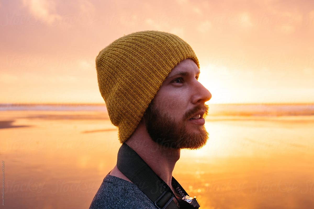 Side Profile Portrait Of Young Male At Beach During Sunset Del