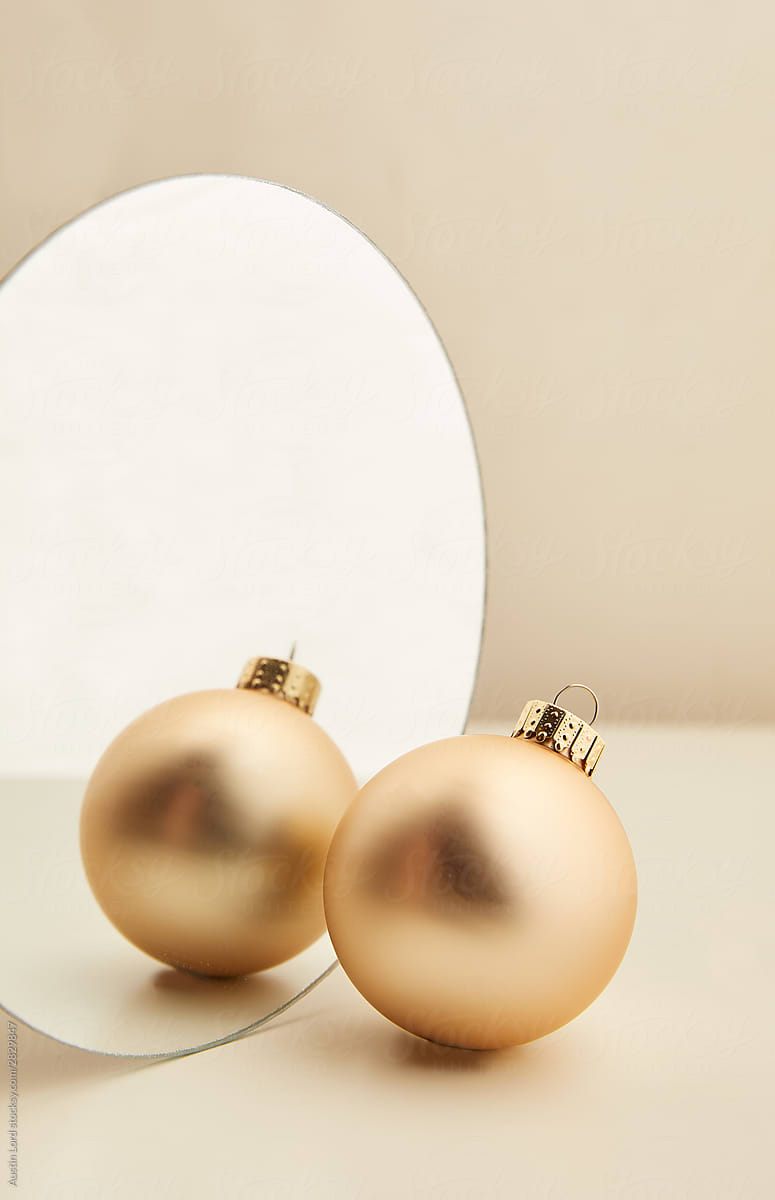 Gold Christmas Ornament  Against Mirror