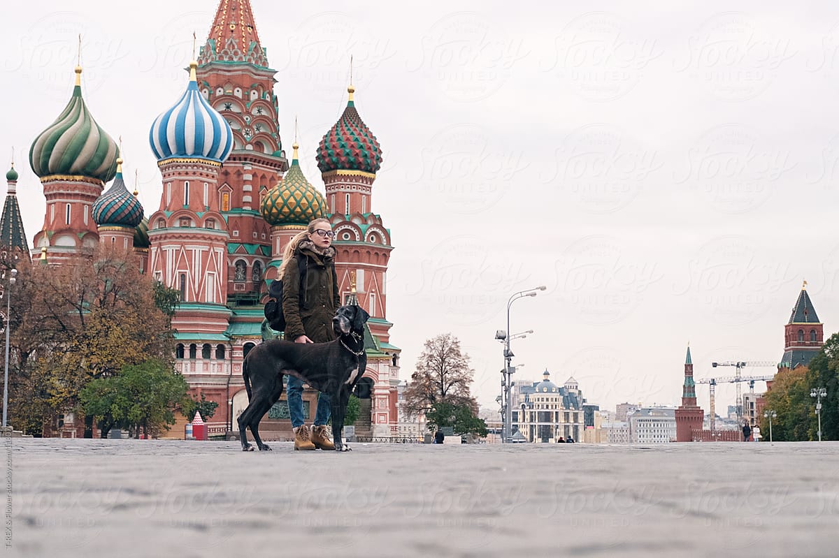 Woman with dog. Red Square