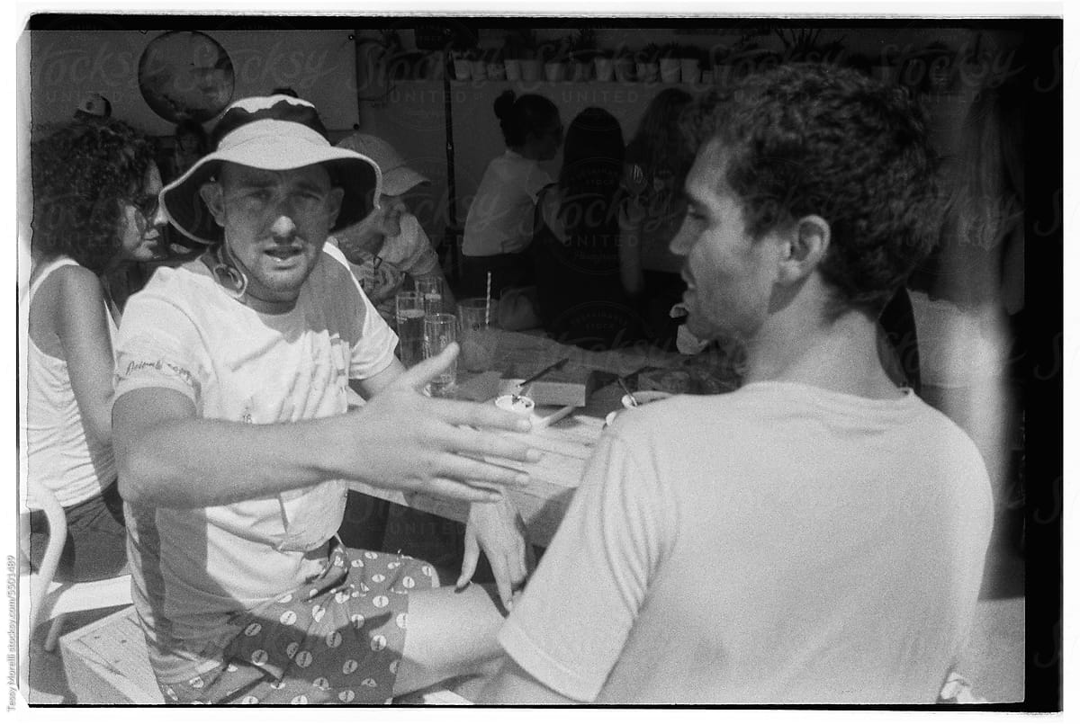 Black and white film group of friends at the table