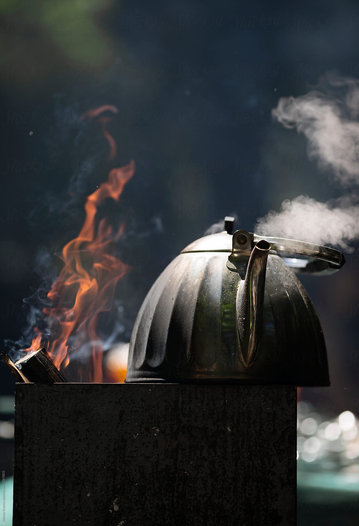 old kettle with boiling water .