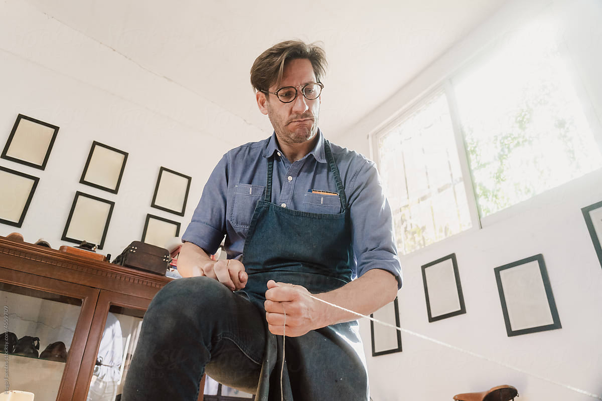 Male Artisan Shoemaker in workshop