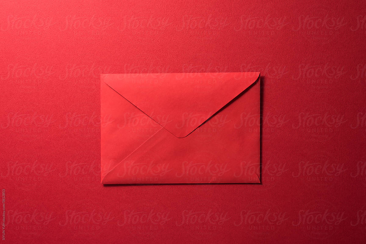 Red letter for Valentine Day on the red background
