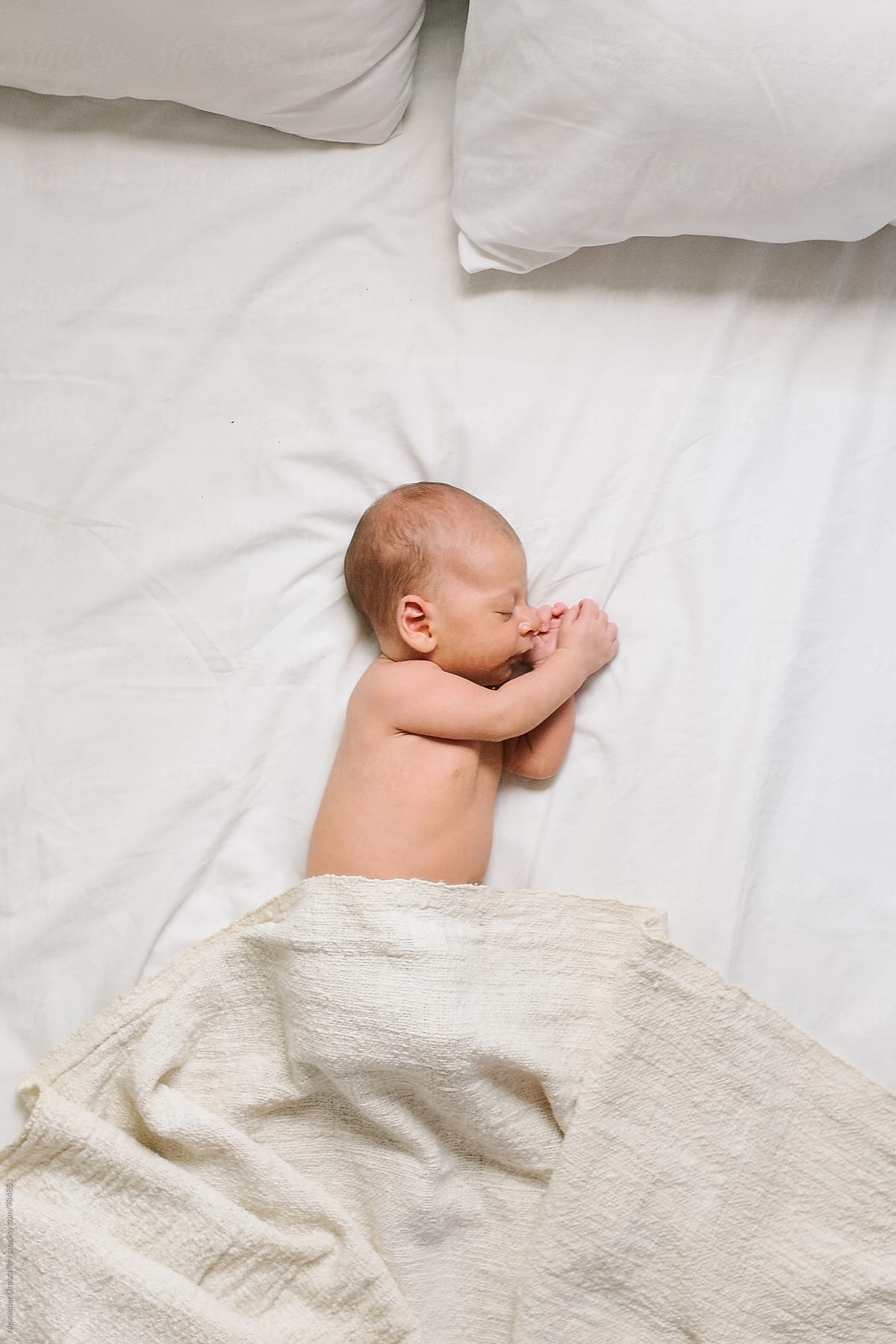 Baby Sleeping Alone In A Bed By Stocksy Contributor Alexander