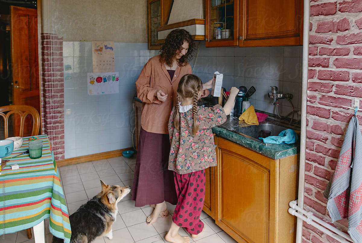 woman with daughter in the kitchen