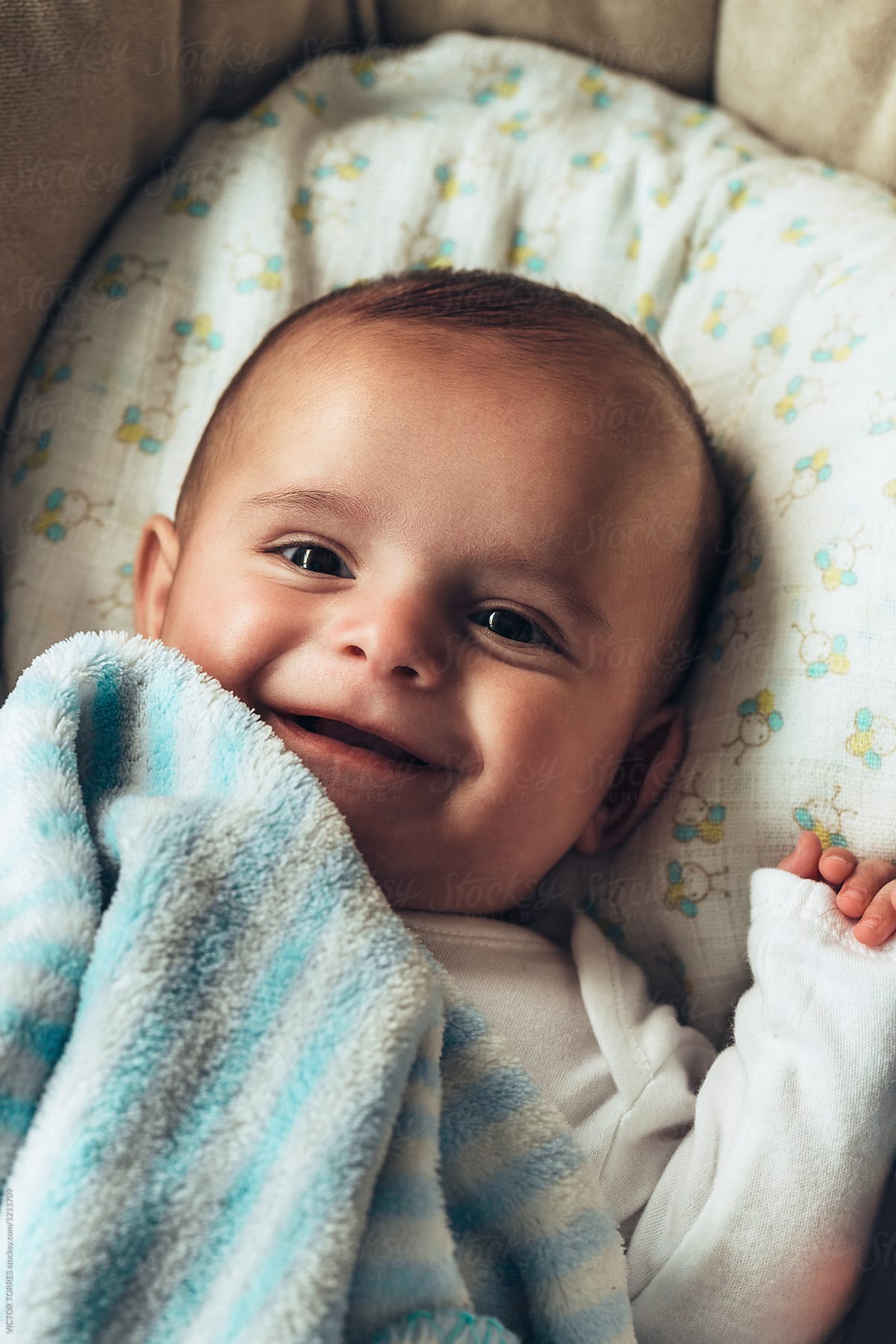 smiling newborn baby boy