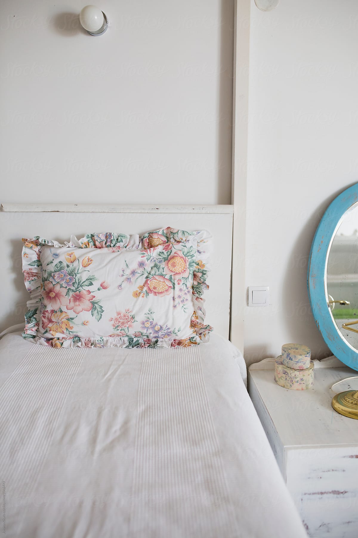 Bed and floral pillow