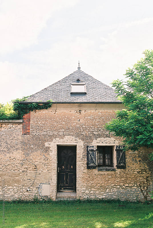 door and window in stone wall