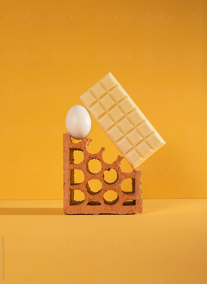 Broken brick with chocolate and egg