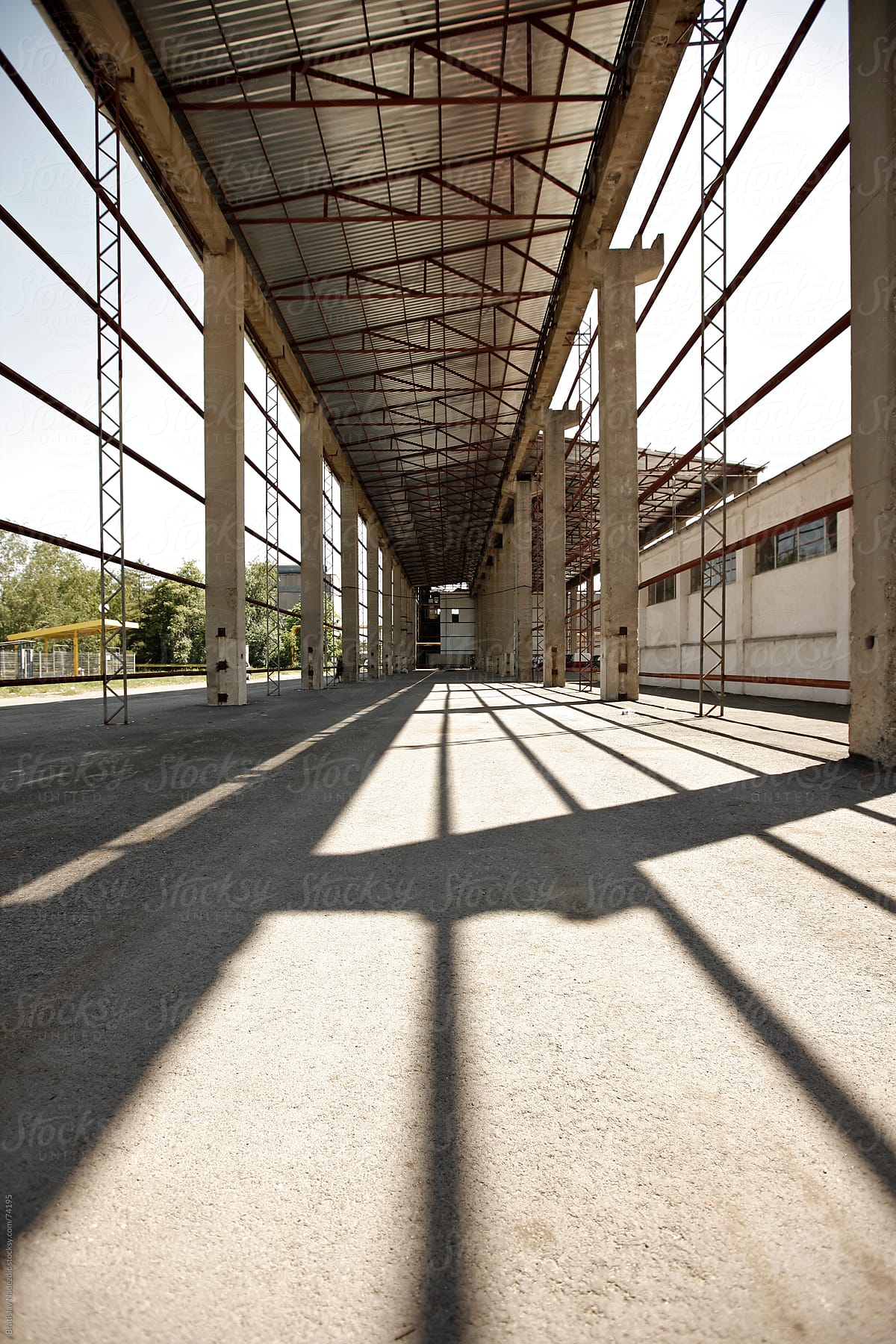 Metal construction of abandoned factory hangar