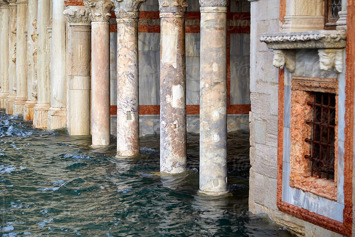 High tides flood Grand Canal palazzo architecture, Venice