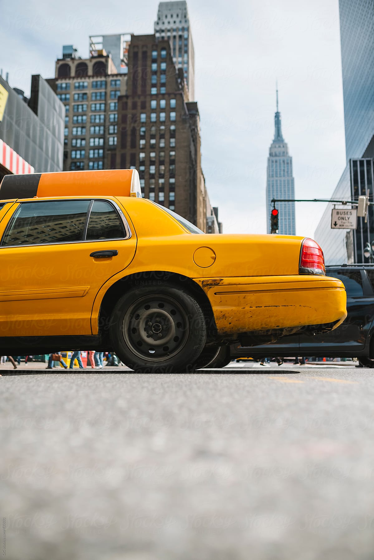 Yellow Cab in Manhattan against Empire State Building