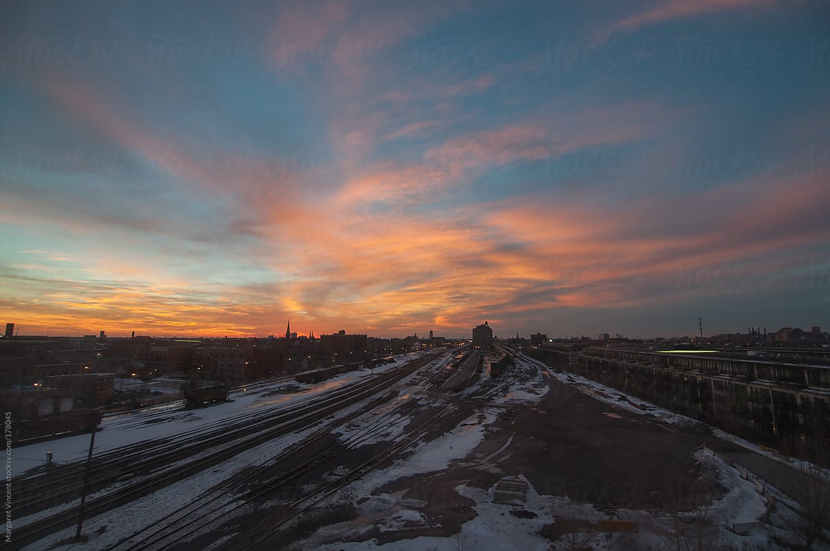 sunset over train tracks
