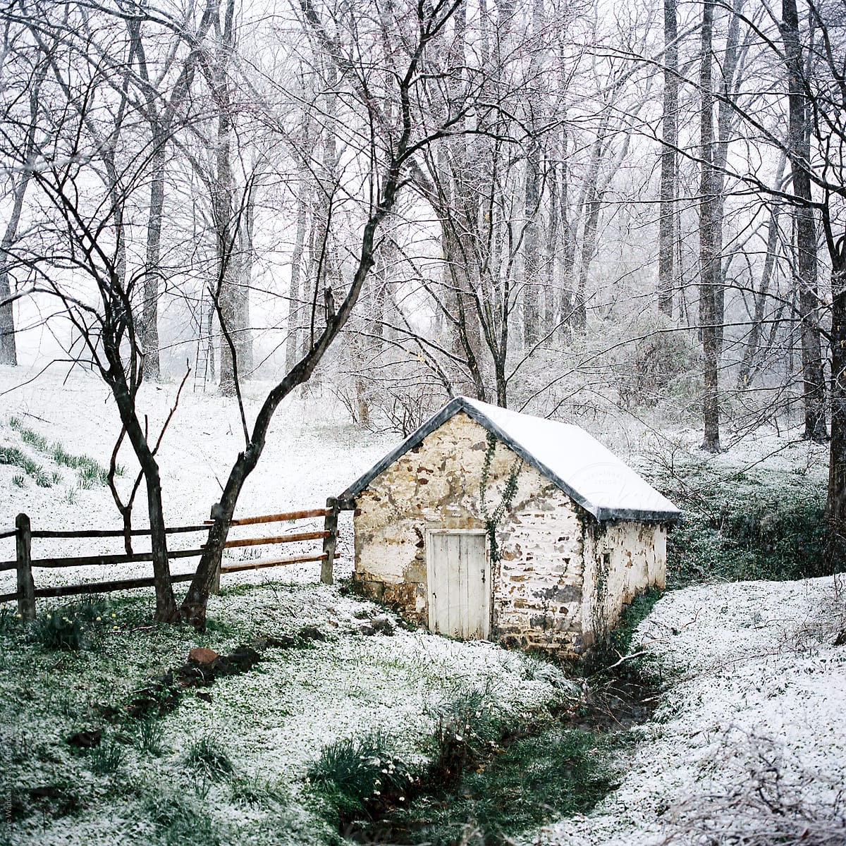 A Pennsylvania Springhouse after a short spring snowfall