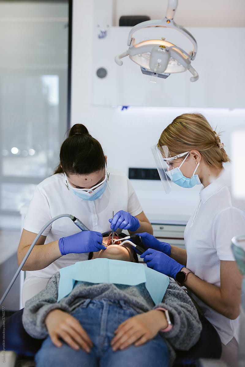 Dentists providing dental treatment together