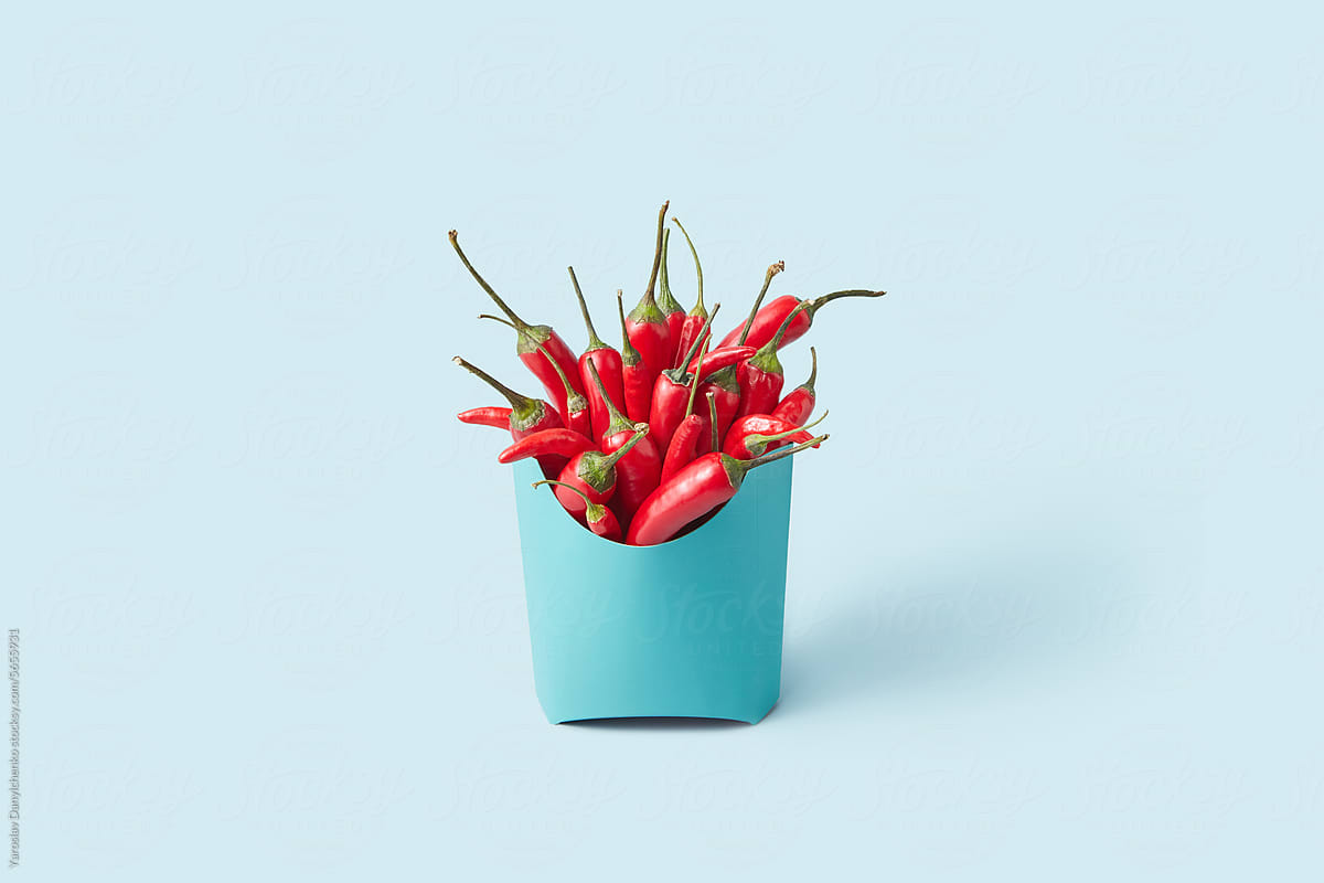 Organic chili peppers inside light blue paper cup
