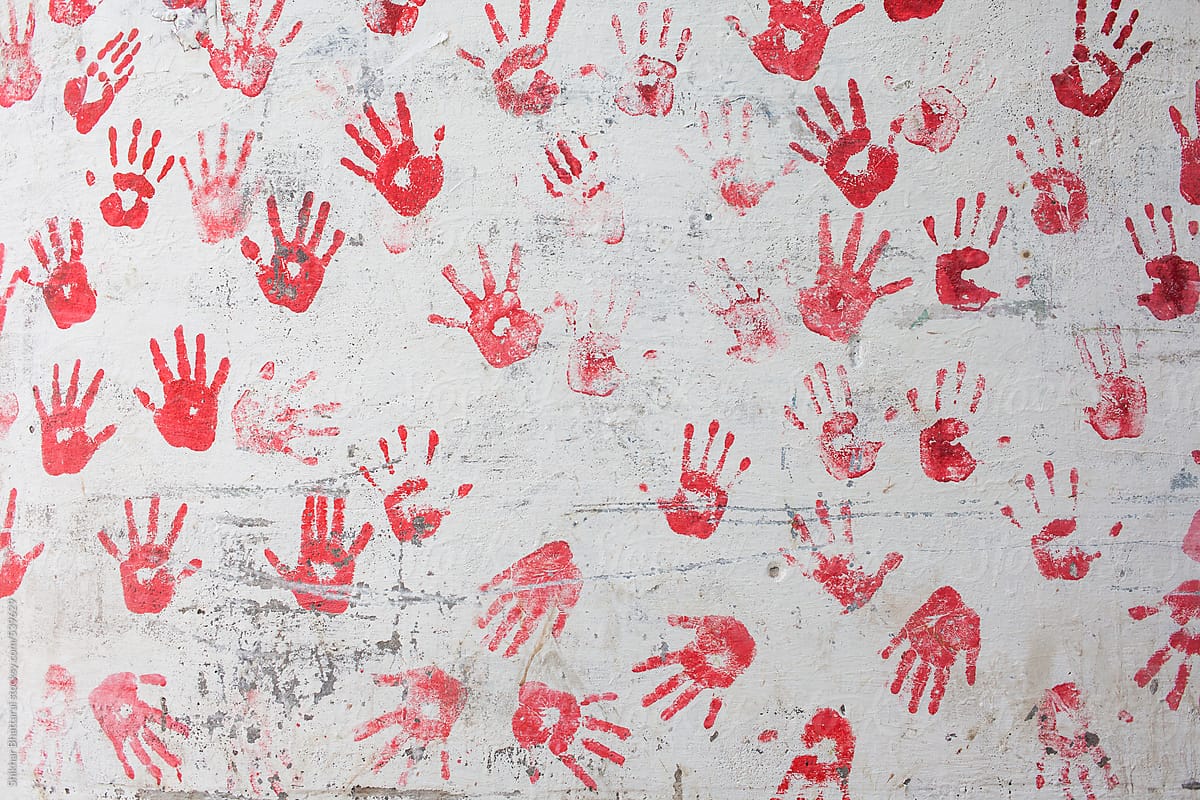 Children Hand prints on a wall.