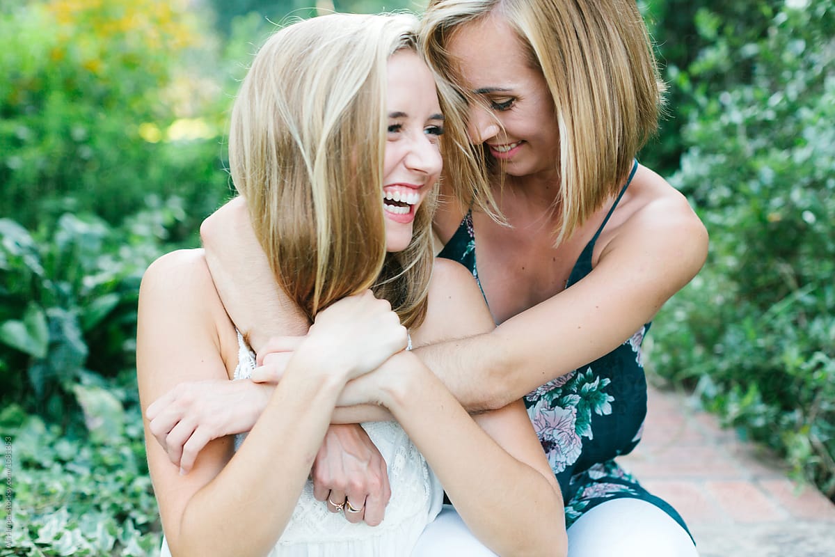 Two Young Girls Laughing And Hugging By Stocksy Contributor Ali Harper Stocksy 