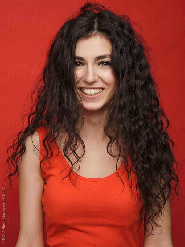Portrait Of A Curly Brunette Girl By Danil Nevsky Stocksy United