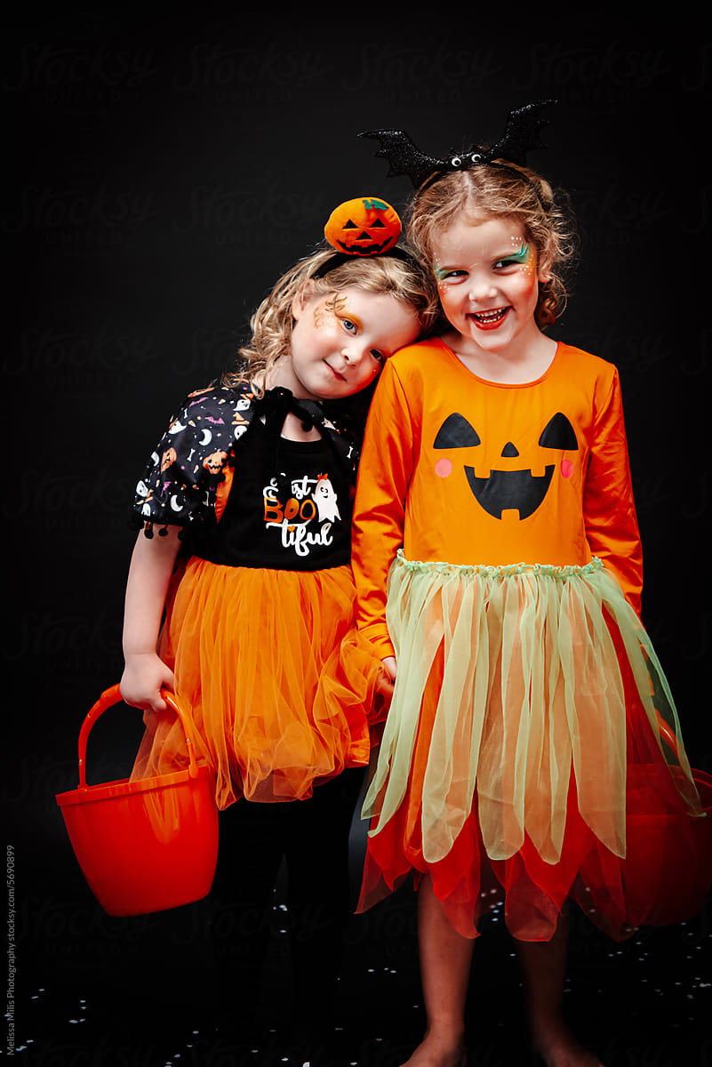 Kids ready for trick or treating in halloween costumes