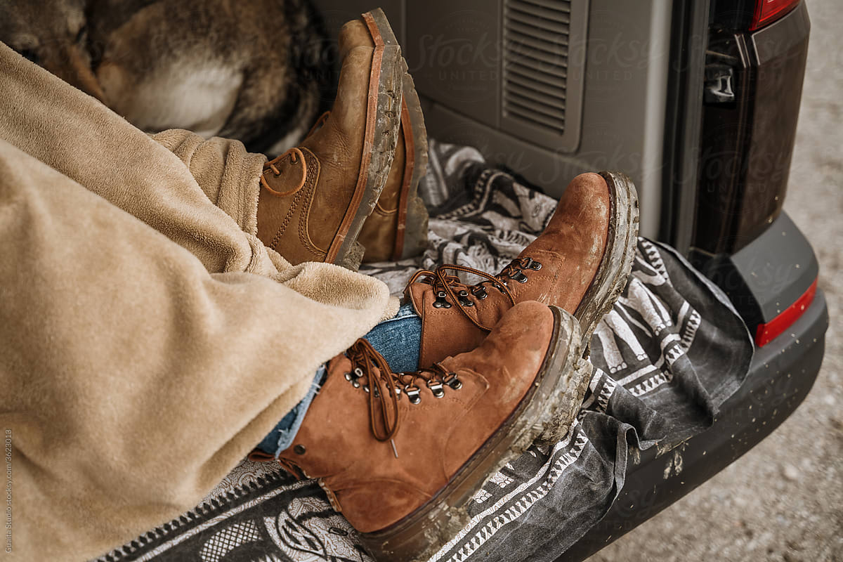 Detail of leather boots with blanket in car van