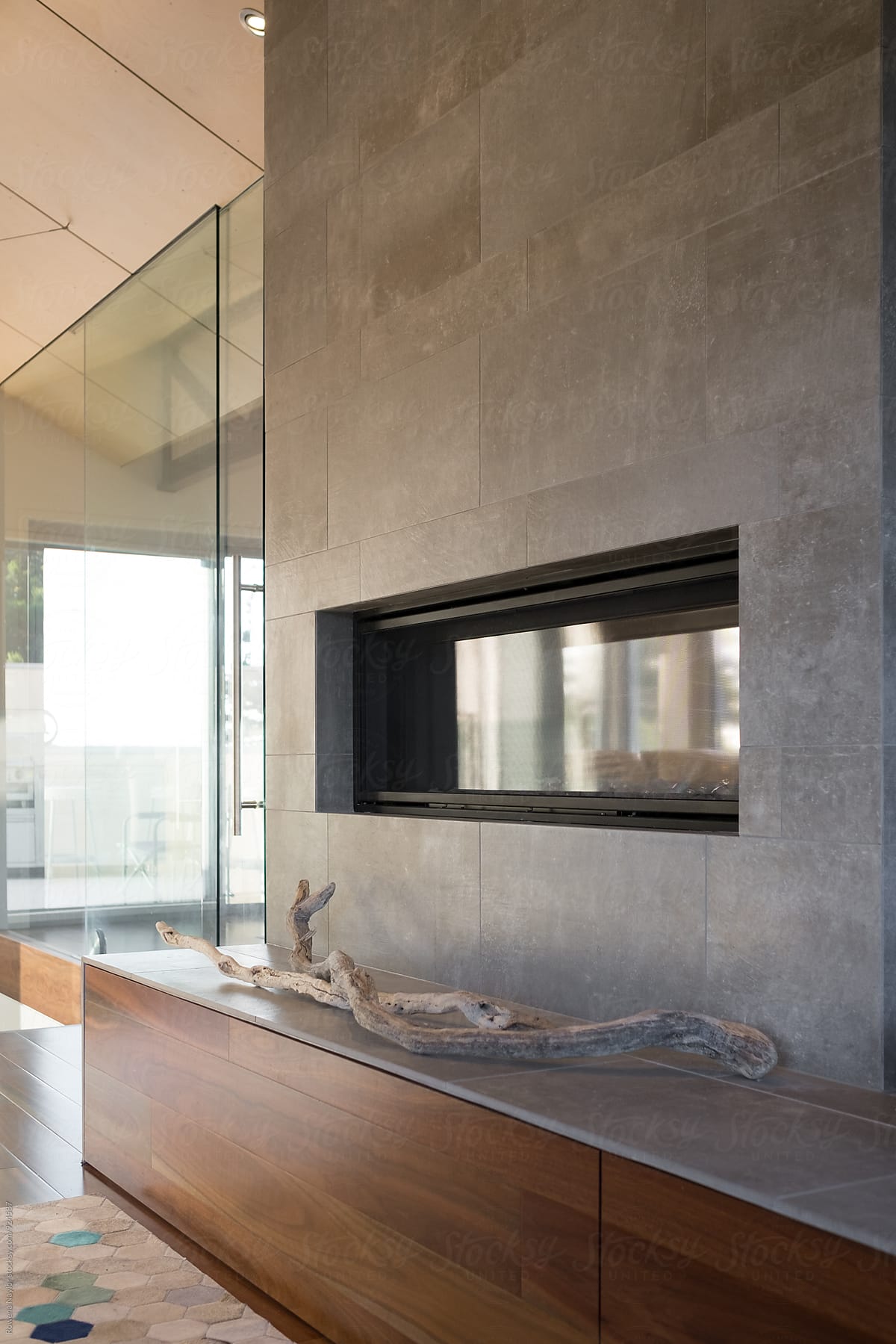 Double sided fireplace in luxurios lounge room