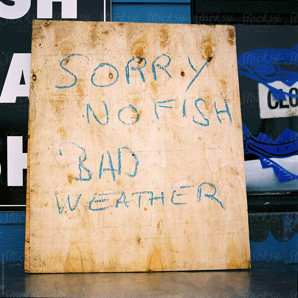 \'Sorry no fish, bad weather\' sign