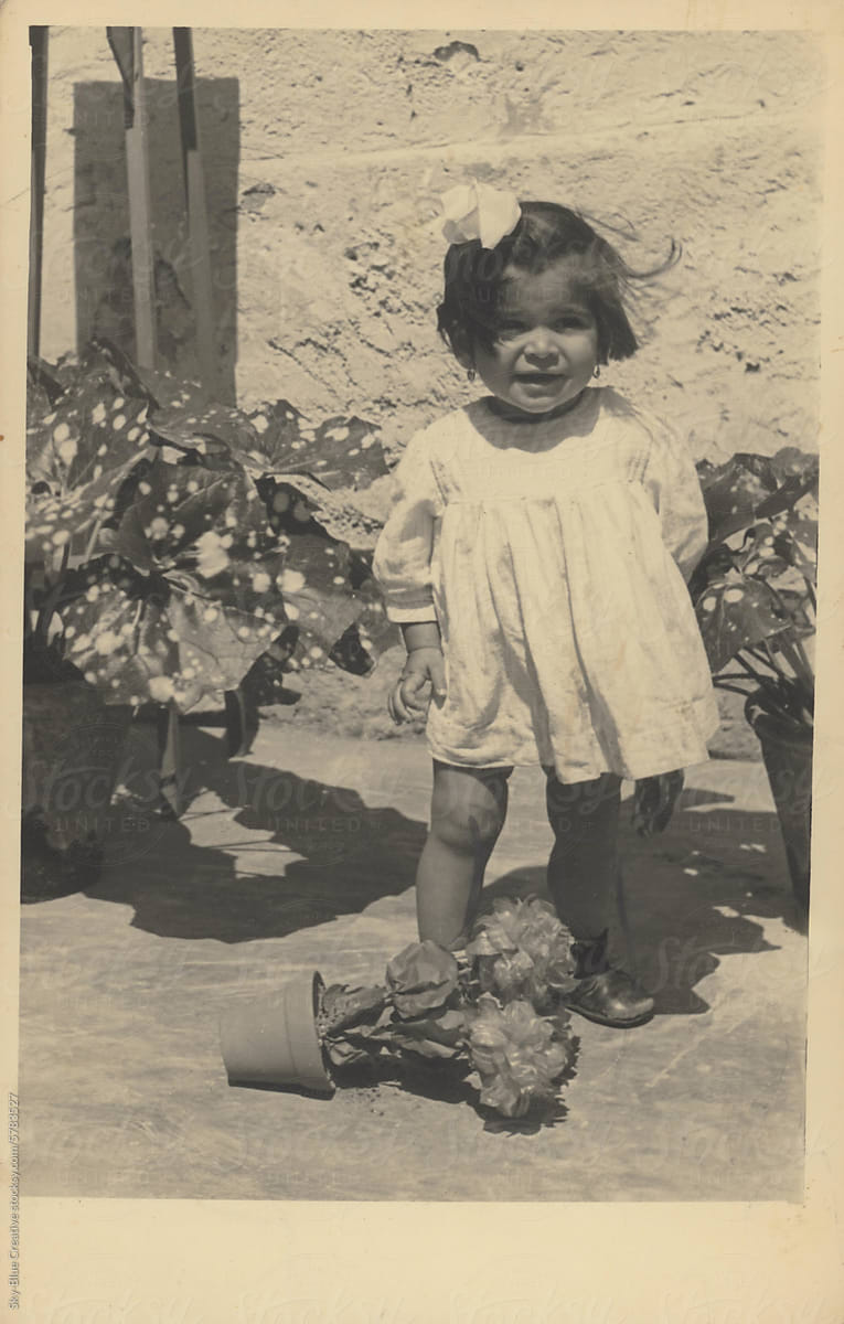 1956.  Child knocks over a vase.