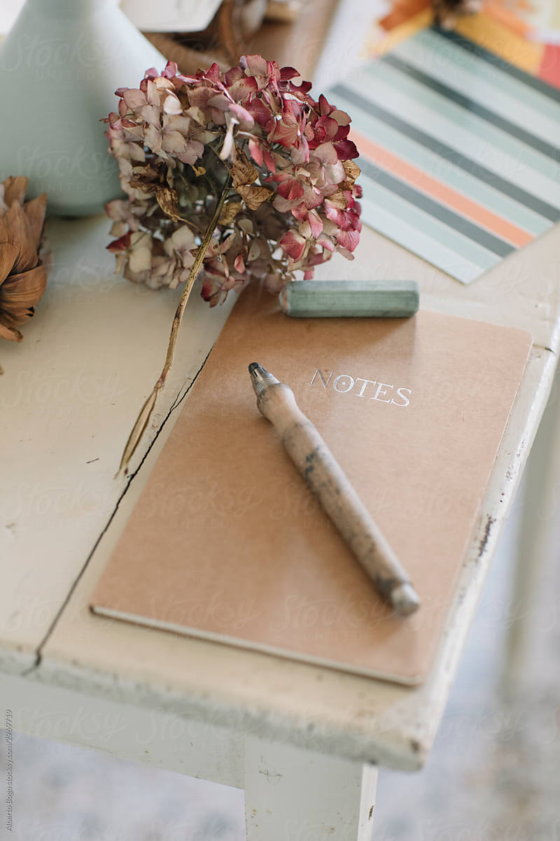 Natural Notebook On Wooden Table With Dry Flowers