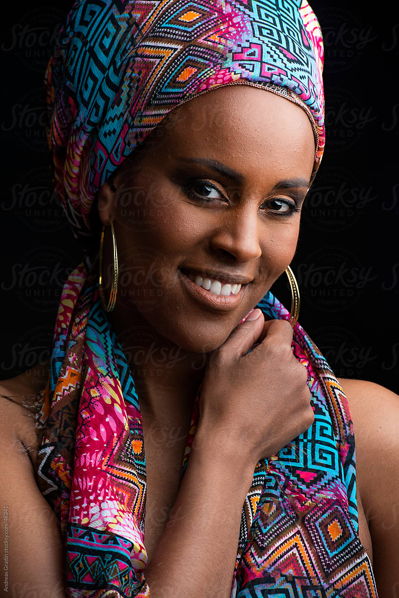Beautiful African Woman Wearing A Traditional Headwrap Stocksy United
